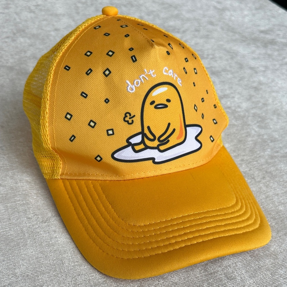 Gudetama by Sanrio “Don’t Care” Yellow Trucker Hat OS